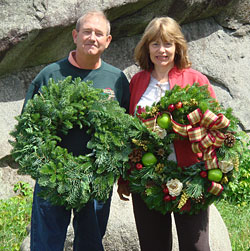 Jack and Faye Beckwith, owners of the Beckwith Family Christmas Trees, choose and cut Christmas outing at the Christmas Tree Station, Hannibal, NY